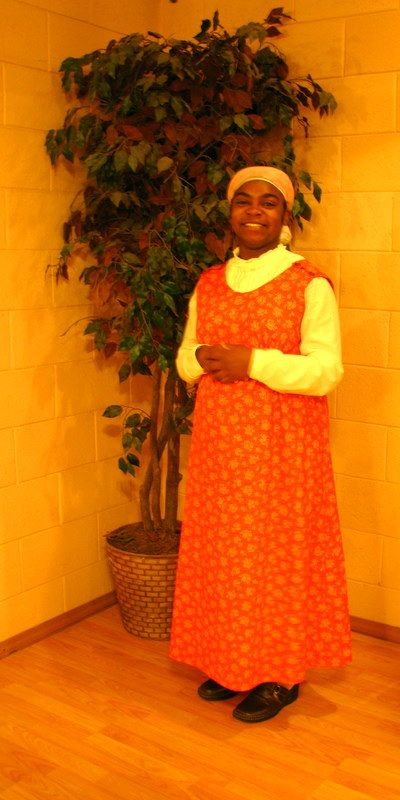 Sis Latosha Makes Orange Jumper.JPG